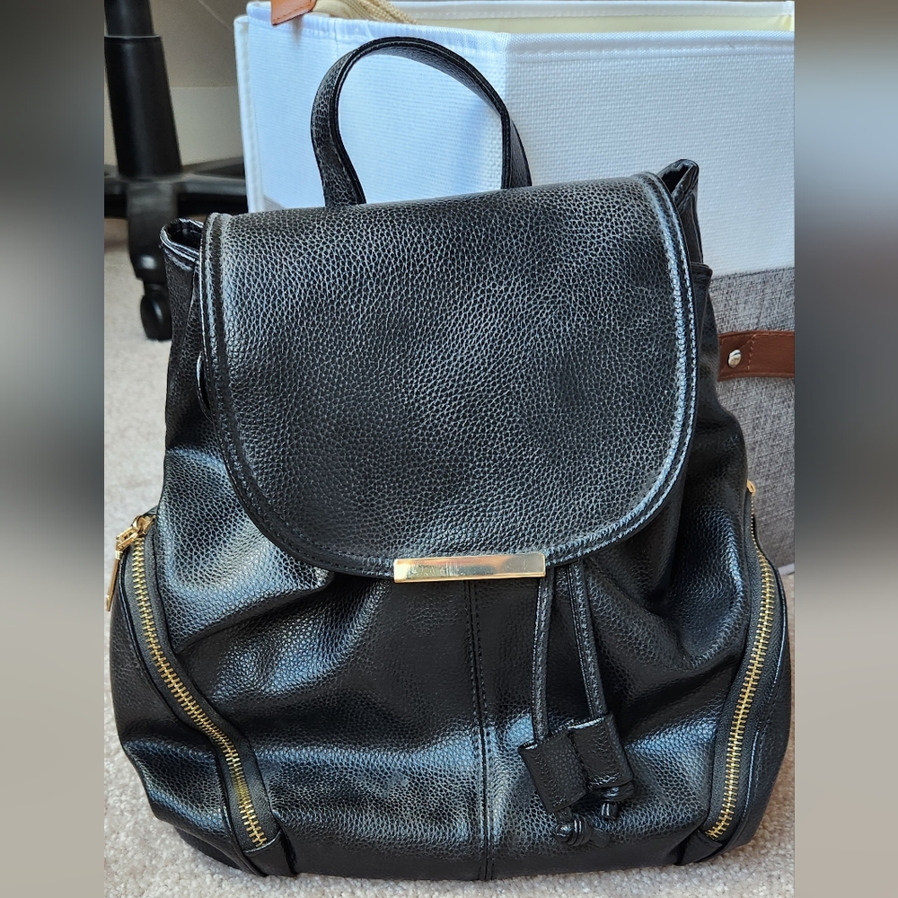 Black leather backpack with gold trim